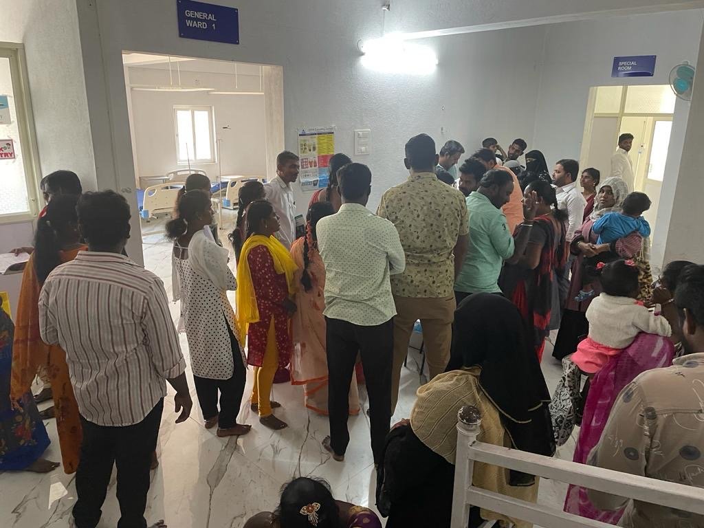 Patients patiently waiting in reception area of Asra hospital